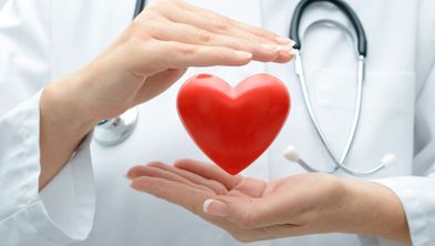 Doctor with lab coat and heart